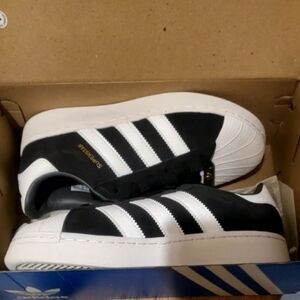 Adidas Men's Black and White Striped Sneakers